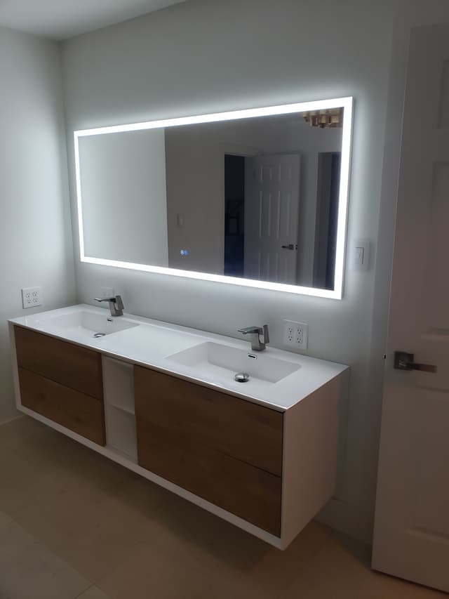 Custom floating bathroom vanity with vessel sinks
