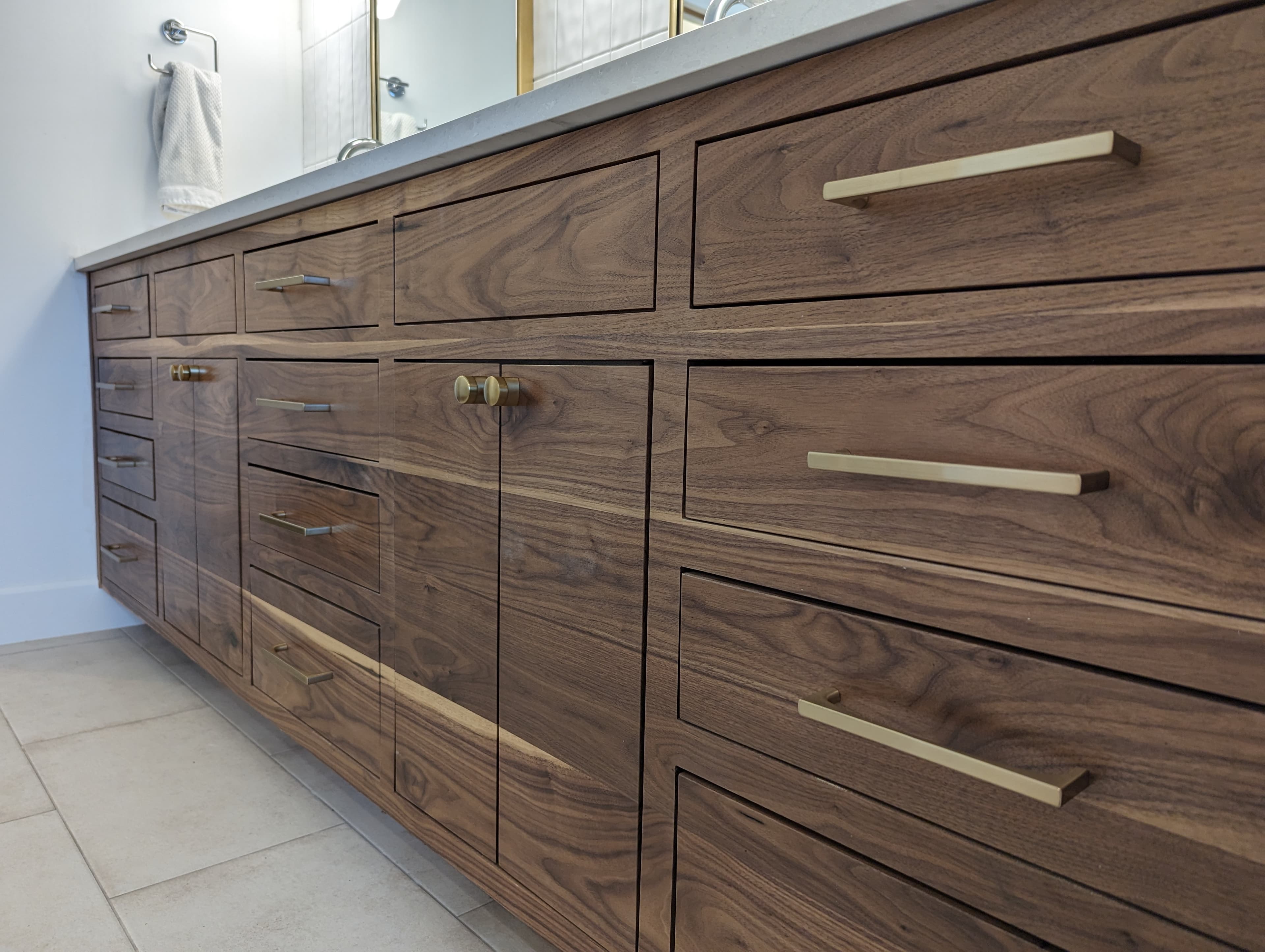 Custom walnut bathroom vanity cabinets by DH Construction San Antonio