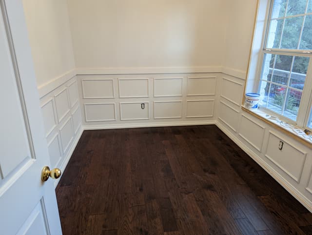 Custom wainscoting paneling in dining room