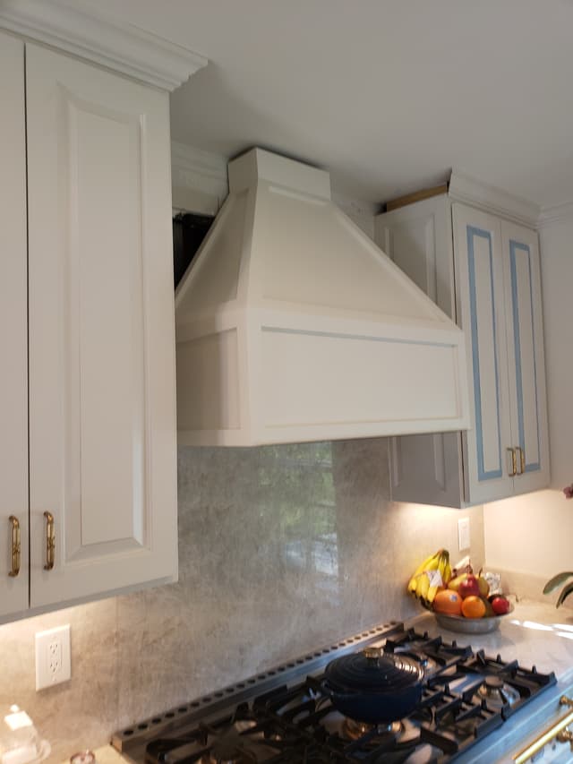 Traditional white kitchen cabinets with raised panel doors