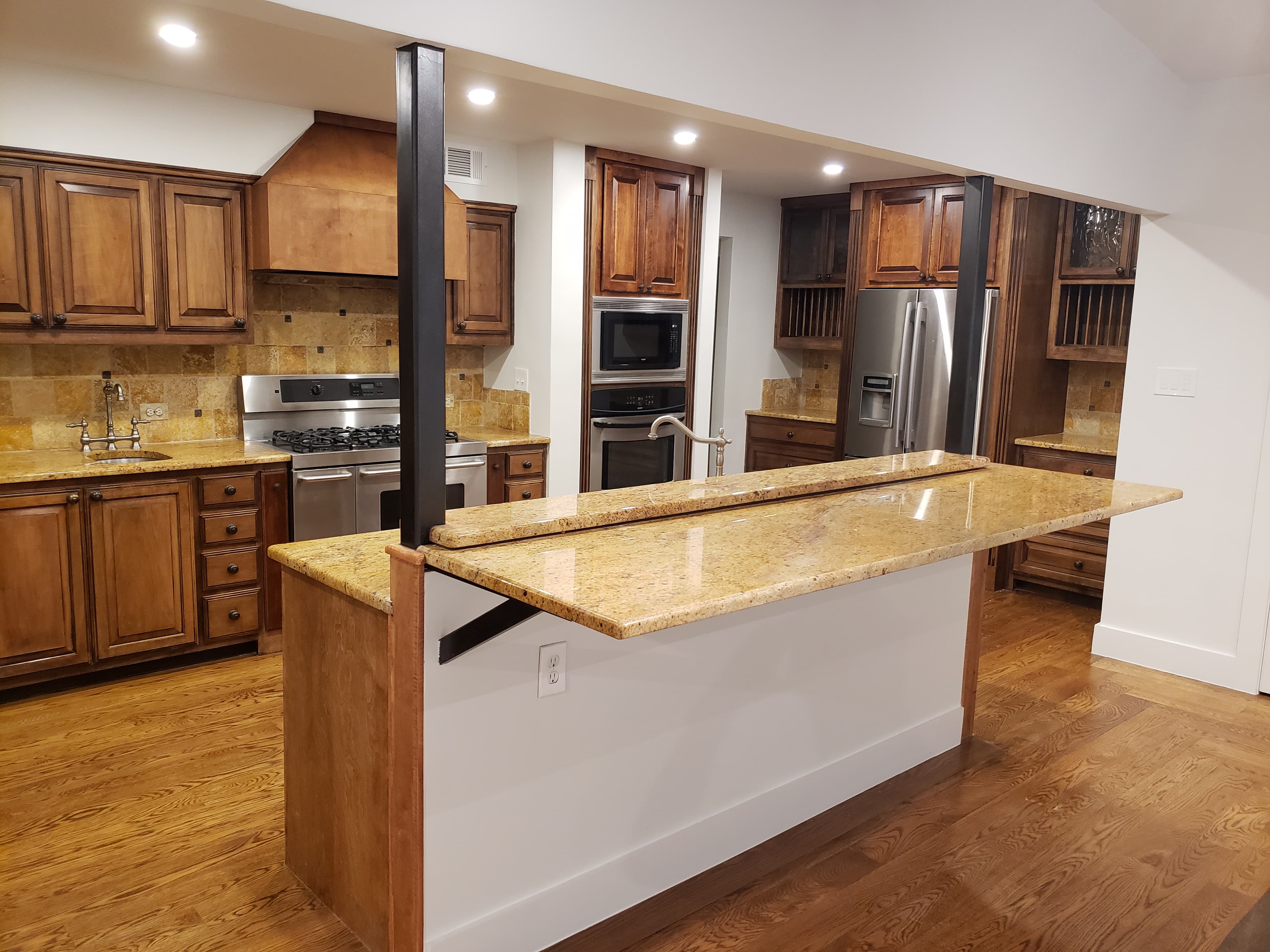 Granite Kitchen with Copper Backsplash
